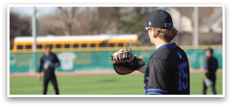 A baseball player in a black shirt and black hat is holding a baseball glove. AI generated content