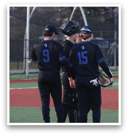 Three baseball players wearing black uniforms and blue numbers on their backs are standing on a baseball field. AI generated content