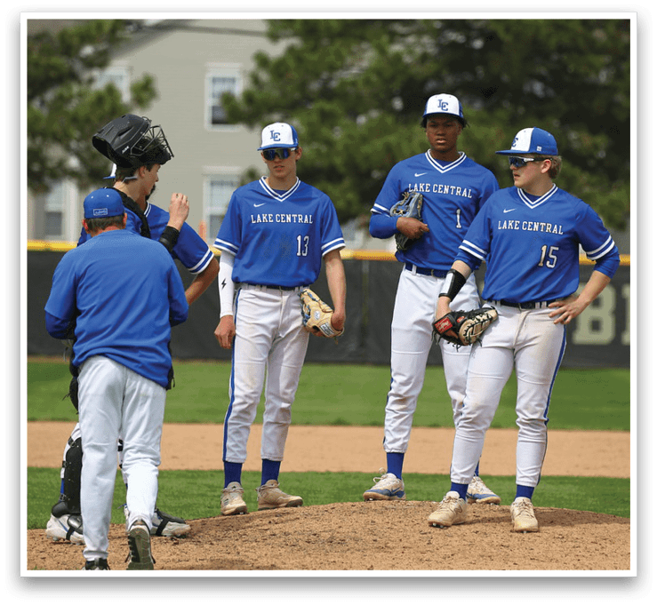 Three baseball players wearing blue uniforms are standing on the field. One player is holding a baseball glove, while another player is holding a baseball bat. The third player is wearing a baseball glove and is standing next to the player holding the bat. The players are likely discussing their game strategy or preparing for their next move. AI generated content