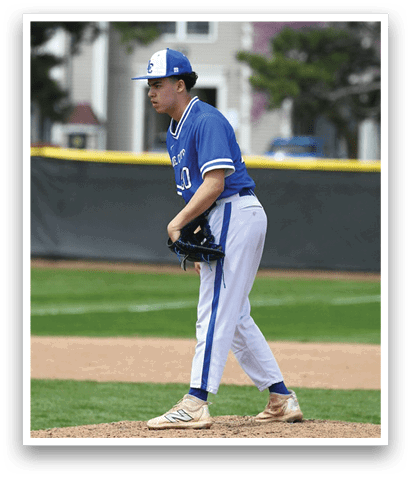 A baseball player in a blue and white uniform stands on the pitcher's mound, holding a baseball glove. AI generated content