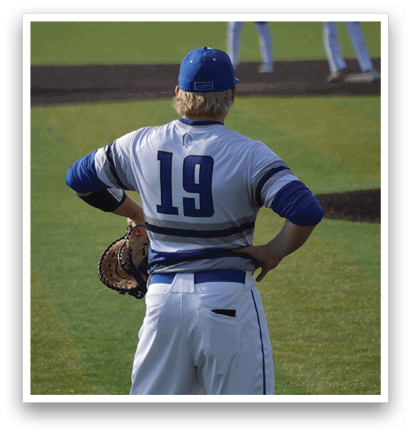 A baseball player wearing a blue cap and a white jersey with the number 19 on the back. AI generated content