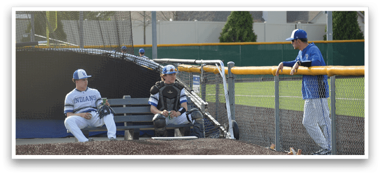 Baseball players sitting on a bench, one of them holding a baseball glove. AI generated content