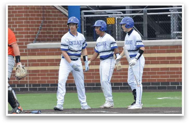 Three baseball players wearing blue and white uniforms are standing on a baseball field. AI generated content