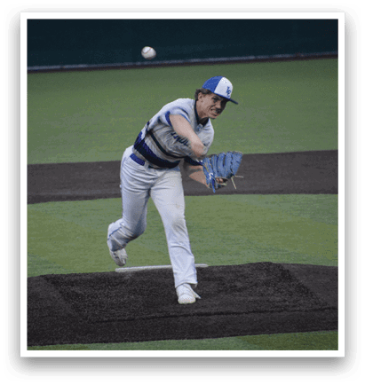 A baseball player in a white and blue uniform is pitching a ball on a field. AI generated content