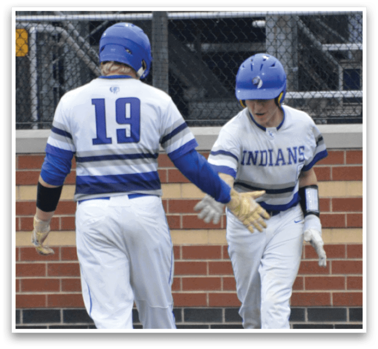 Two baseball players wearing white uniforms and blue caps are walking on the field. AI generated content