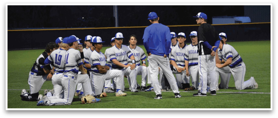 A group of baseball players huddled together on a field, listening to their coach. AI generated content