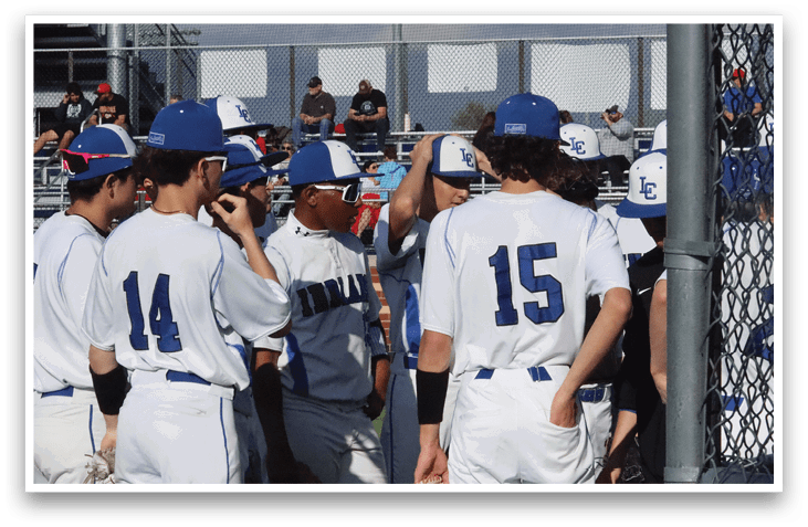 Baseball players wearing blue and white uniforms are standing together on a field. AI generated content