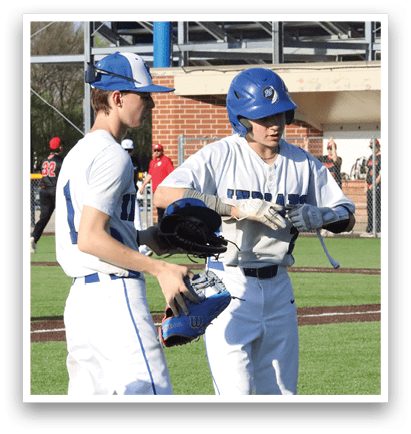 Three baseball players wearing blue helmets and white uniforms are standing on a field. AI generated content
