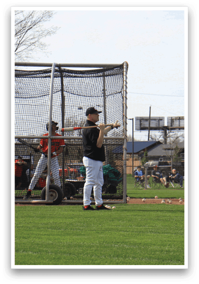 Baseball players on a field, one of them holding a bat, preparing to hit a ball. AI generated content