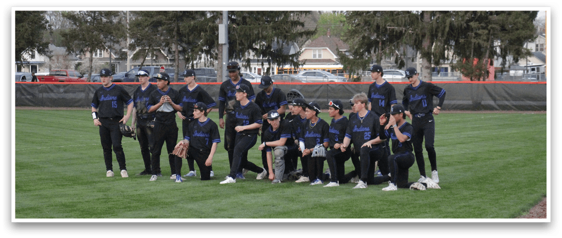 A group of young men wearing black shirts and white shoes pose for a picture on a grassy field. AI generated content