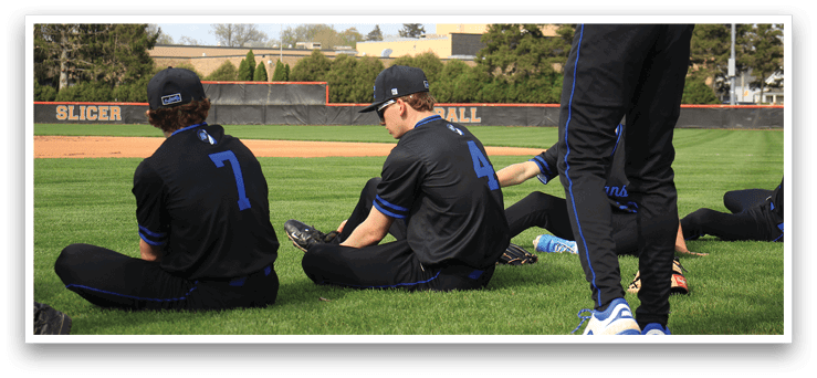 Baseball players sitting on the grass. AI generated content