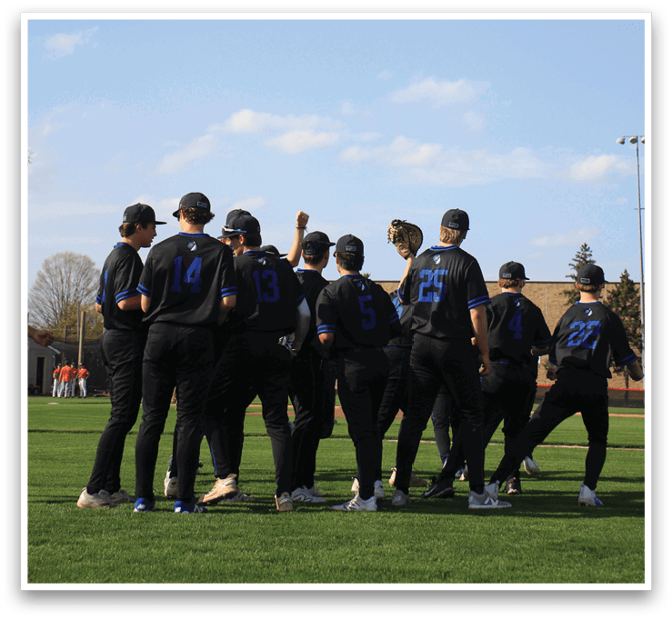 A group of young men wearing black shirts and black pants are standing on a grassy field. AI generated content