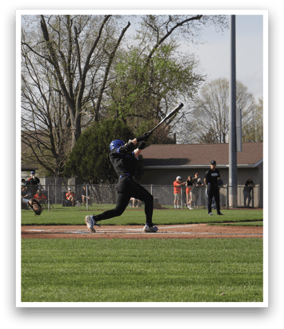 A baseball game is taking place with a batter swinging at a ball. The catcher is positioned behind the batter, ready to catch the ball. There are several other people in the scene, likely teammates and opponents. The game is being played on a baseball field with a baseball bat and a baseball glove visible. AI generated content