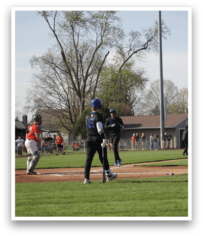 A group of people are playing baseball on a field. AI generated content