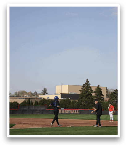 Two people are walking on a baseball field. AI generated content