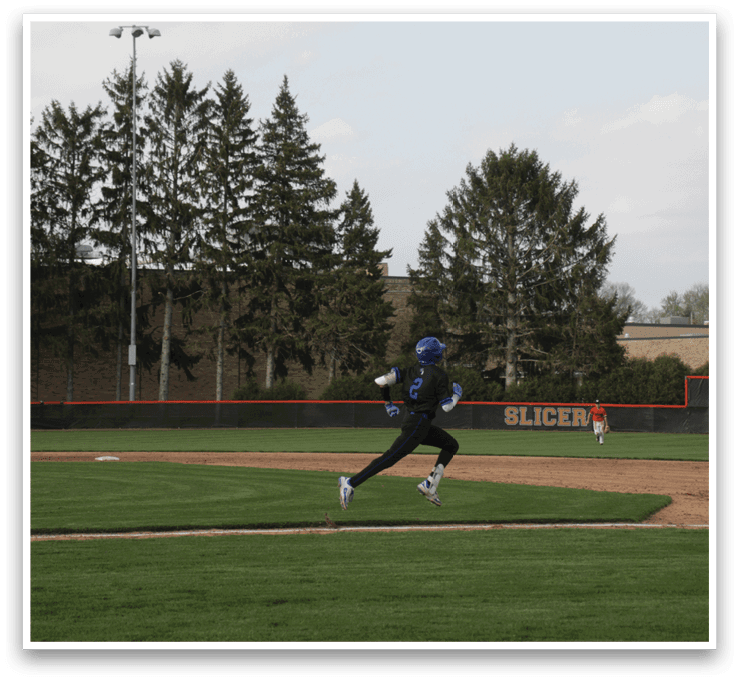 A person wearing a blue hat and black shirt is running on a baseball field. AI generated content