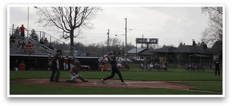 A baseball game is taking place with a batter at home plate, holding a bat and getting ready to swing. The catcher is positioned behind the batter, wearing a baseball glove. There are several other people in the scene, including players and possibly coaches. A car can be seen in the background, parked near the field. AI generated content