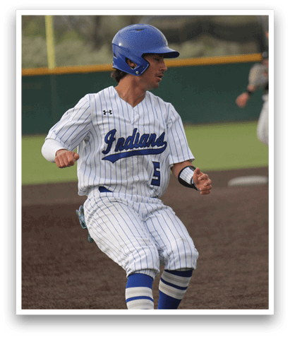 A baseball player in a white and blue uniform is sliding into a base. AI generated content