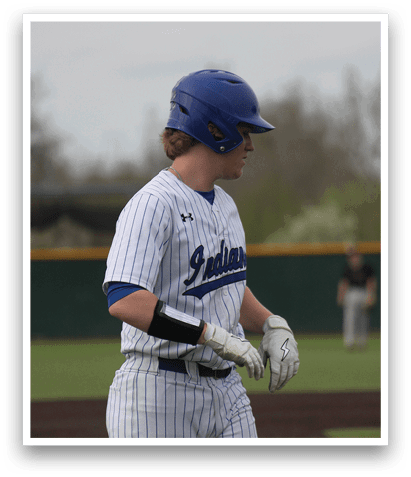 A baseball player wearing a blue helmet and white uniform is walking on the field. AI generated content