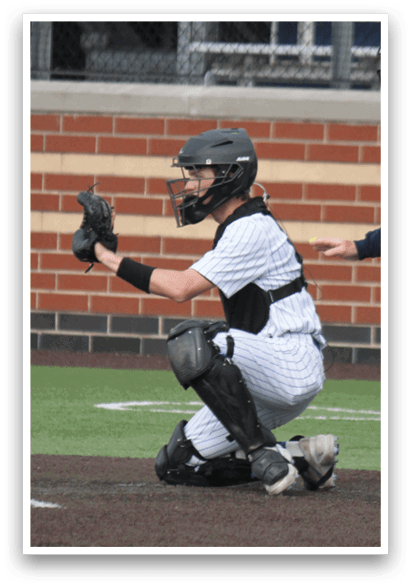 A baseball player is sitting on the ground with his hands up, while an umpire stands behind him. AI generated content