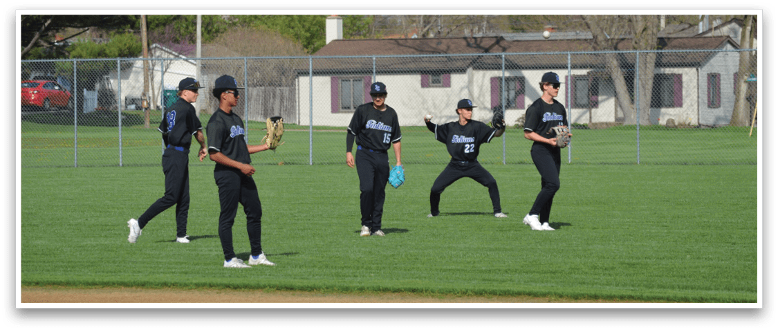 Four baseball players are standing on a field, holding baseball gloves and bats. They are wearing black uniforms and are positioned in various locations on the field. AI generated content