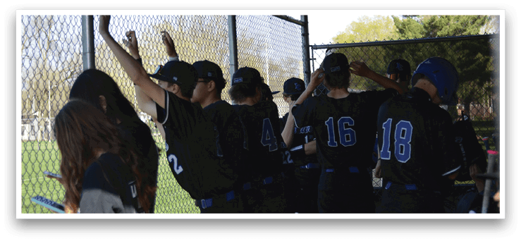 A group of young baseball players are standing in the dugout, wearing their uniforms and waiting for their turn to play. AI generated content