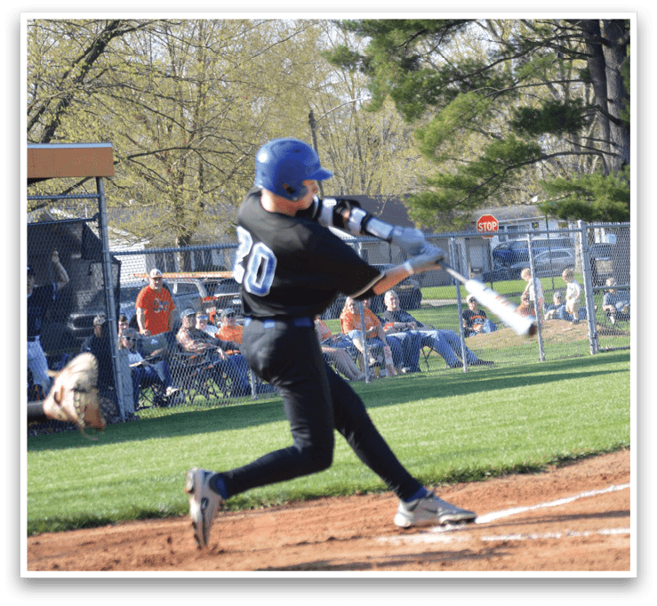 A baseball player in a black shirt and blue helmet is swinging a bat at a ball. AI generated content