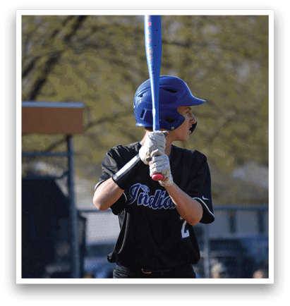 A baseball player is holding a bat, ready to swing. AI generated content