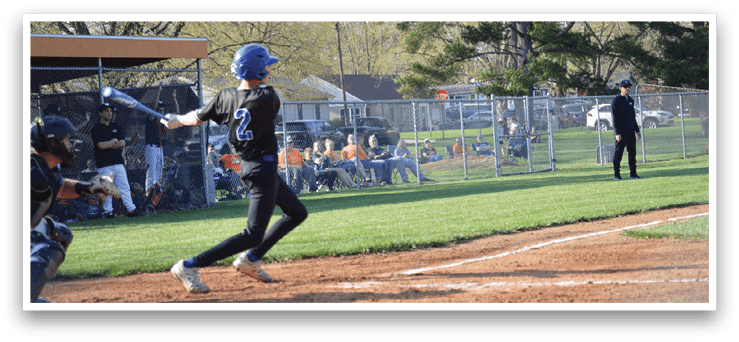A baseball player in a black shirt and blue helmet is swinging a bat at a ball. AI generated content