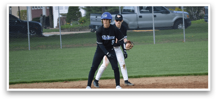 Two baseball players are on the field, one wearing a blue helmet and the other wearing a black helmet. They are both holding baseball gloves, ready to catch the ball. In the background, there are cars parked, and a truck is visible. AI generated content