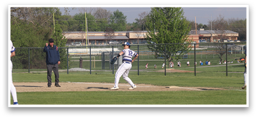 A baseball player is up to bat, holding a baseball bat and preparing to swing. AI generated content
