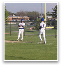 Two baseball players are standing on a field, one of them wearing a blue helmet. AI generated content
