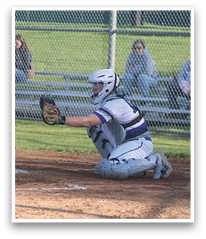A baseball player is swinging a bat, while a catcher and an umpire watch closely. The catcher is wearing a baseball glove, and the umpire is positioned behind him. There are several other people in the scene, some of whom are sitting on a bench. AI generated content