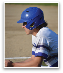 A young man wearing a blue helmet and a white shirt is sitting on the ground. AI generated content