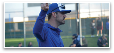 A man wearing a blue shirt and a blue hat is pointing at something. AI generated content