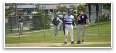 Two baseball players are standing on a field, one wearing a blue helmet. AI generated content