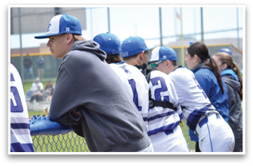 Baseball players wearing blue and white uniforms are standing on a field. AI generated content