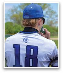 A young man wearing a baseball jersey with the number 18 on the back is holding a cell phone. AI generated content