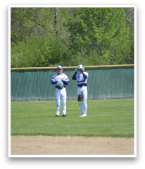 Two baseball players are standing on a field, one of them holding a water bottle. AI generated content