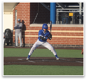 A baseball player is at bat, holding a bat and preparing to swing. There are several other people in the scene, including a catcher and an umpire, all focused on the batter. AI generated content