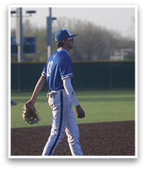 A baseball player in a blue and white uniform is walking on the field. AI generated content