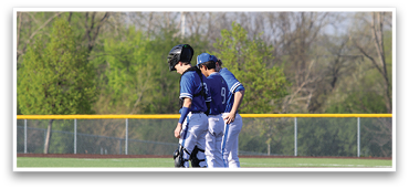 Four baseball players wearing blue uniforms are standing on a field, shaking hands and exchanging a baseball glove. AI generated content