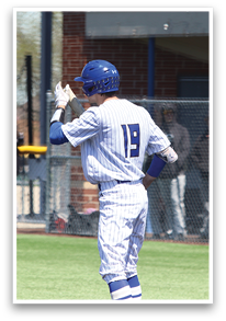 A baseball player wearing a blue helmet and white uniform is waving to the crowd. AI generated content