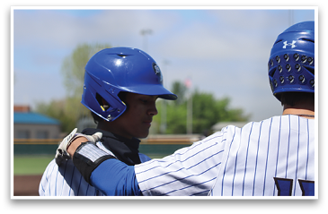 Two baseball players wearing blue helmets and white uniforms are standing next to each other. AI generated content