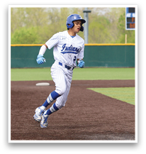 A baseball player is running towards home plate, wearing a blue helmet. AI generated content