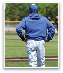 A baseball player wearing a blue hoodie and blue cap stands on the field. AI generated content