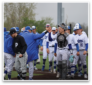 A group of baseball players are on the field, some wearing blue and white uniforms. They are shaking hands and congratulating each other. AI generated content