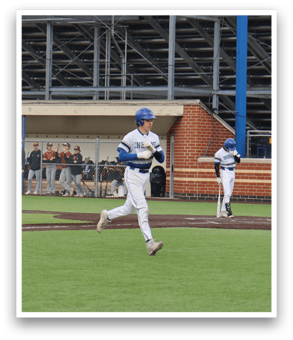 A baseball game is taking place in a stadium. Description generated by AI