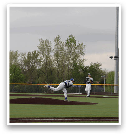 A baseball player is pitching a ball on a field. Description generated by AI