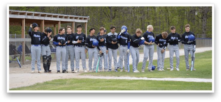 A group of young men standing on a baseball field. Description generated by AI